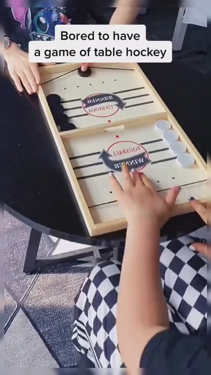 Table Hockey Puck Slinging Game